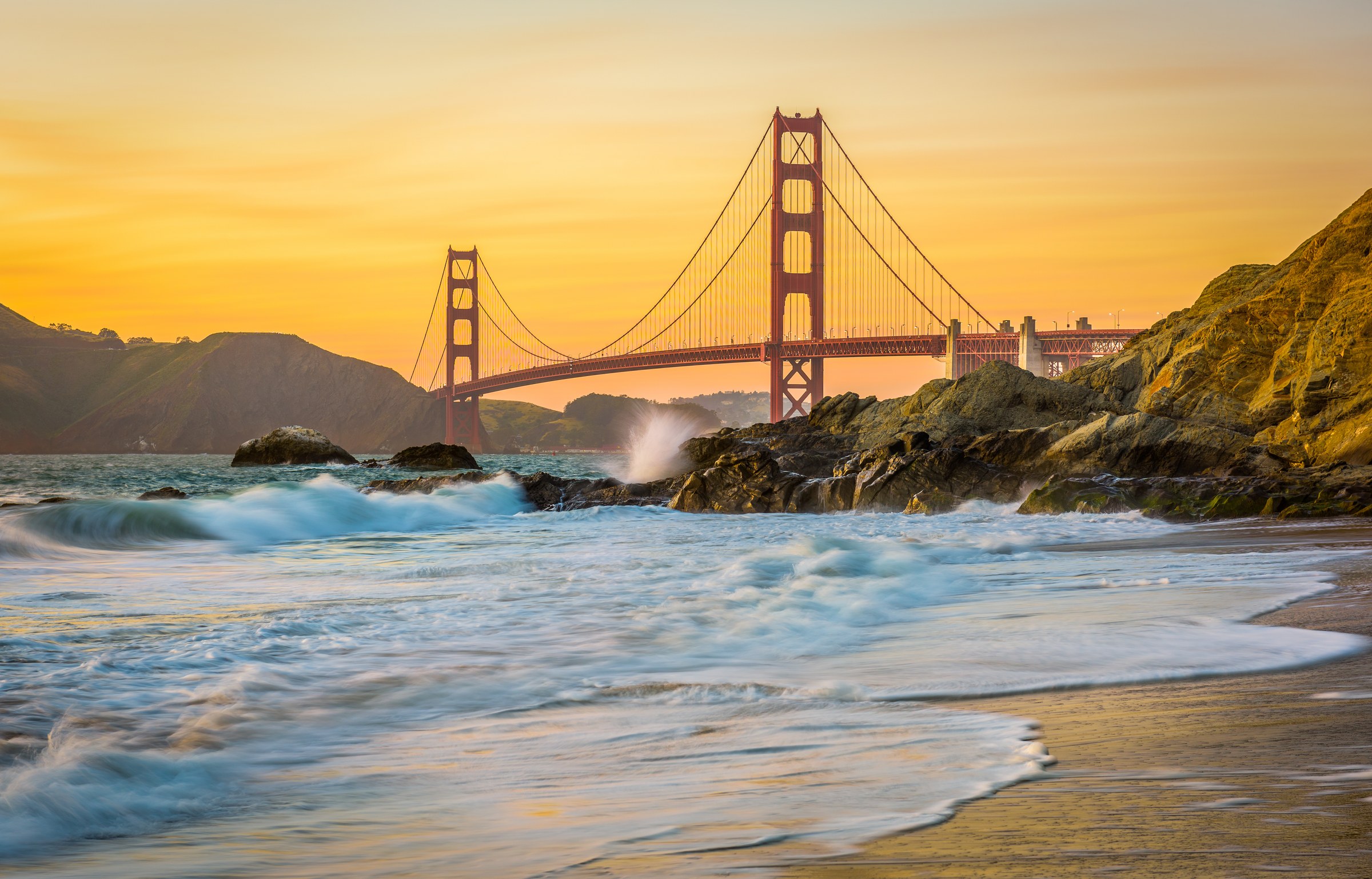 Golden Gate Bridge viewed from Baker Beach at sunset